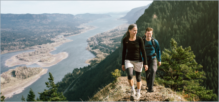 Couple walking a trail.